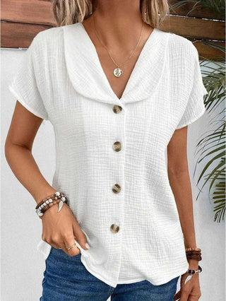 Anthousa | button-up top | white with subtle dot pattern | front view