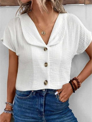 Anthousa | button-up top | soft blue | three-quarter side view