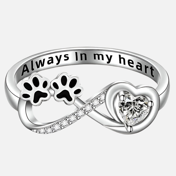 Ring with zirconia in the shape of a paw with a design in the form of a heart and infinity